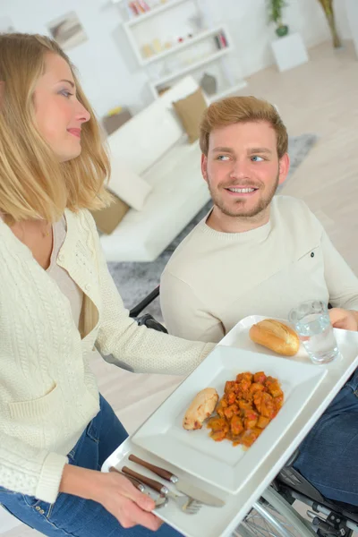 Serving her disabled boyfriend — Stock Photo, Image