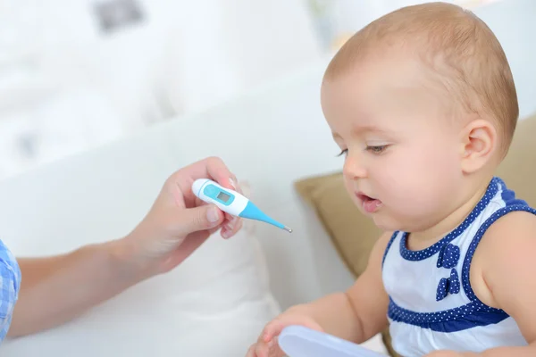 Feeding her baby boy — Stock Photo, Image