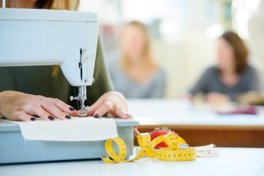 Sewing class and arms clipart