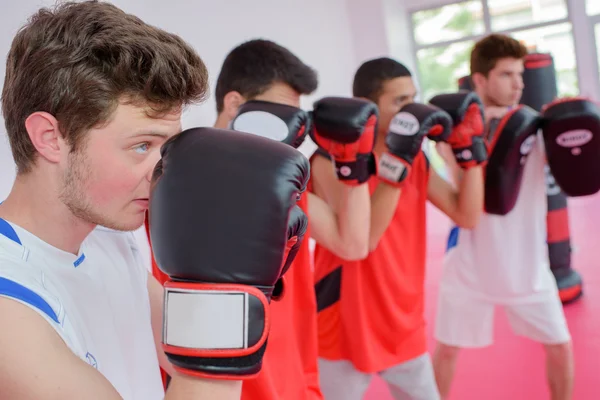 Young men with gloves — Stock Photo, Image