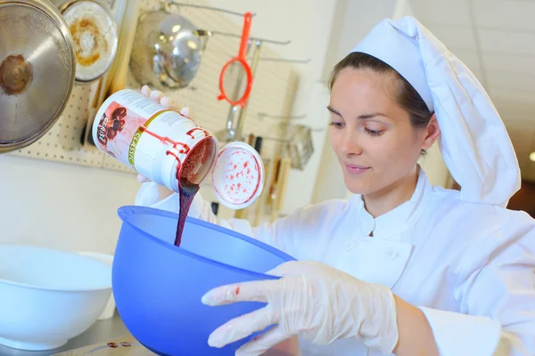 Pouring syrup and woman — Stock Photo, Image