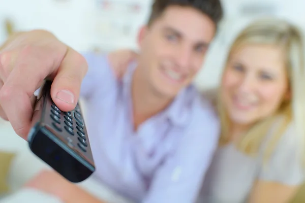 Couple watching television and couple — Stock Photo, Image