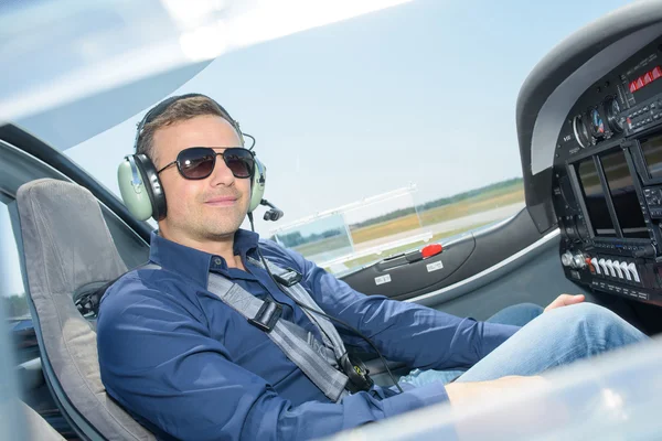 In the cockpit and man — Stock Photo, Image