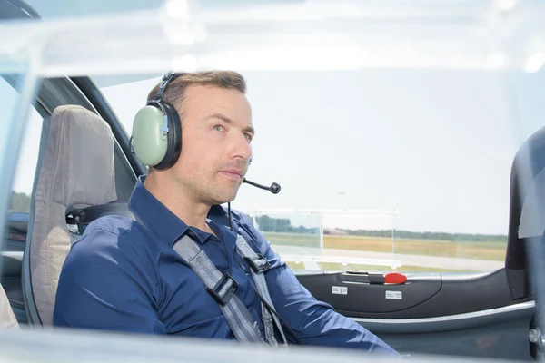 Pilot in light aircraft — Stock Photo, Image