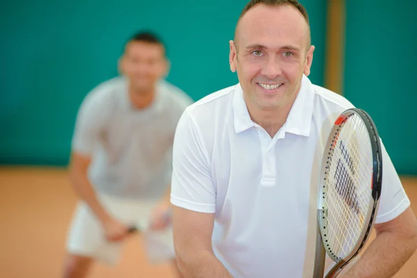 Tennis players and two — Stock Photo, Image