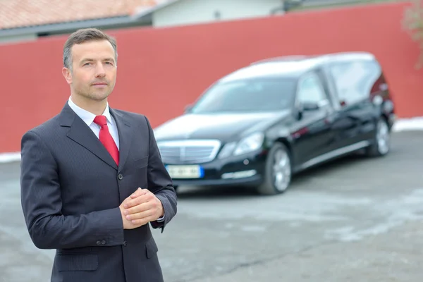 Limousine driver and suit — Stock Photo, Image