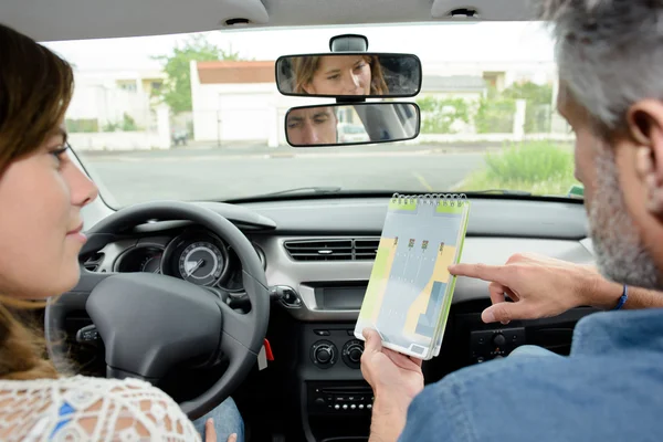 driving teacher and woman