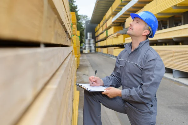 Warehouse worker and man — Stock Photo, Image