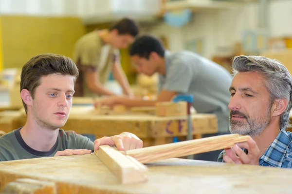 Carpentry factory and man — Stock Photo, Image