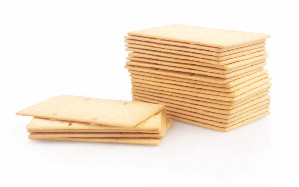 Kekse oder Cracker auf weißem Hintergrund — Stockfoto