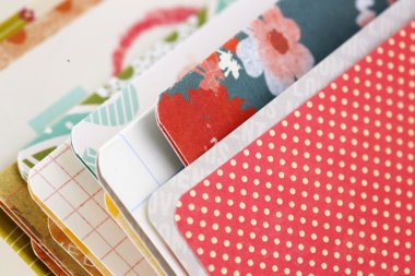 Paper samples with different patterns and colours clipart