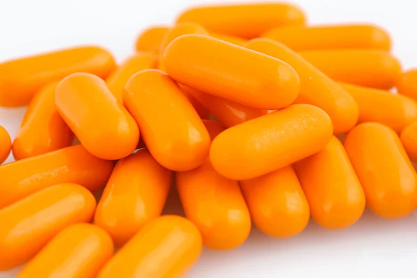 Macro vista de pilha laranja de pílulas — Fotografia de Stock
