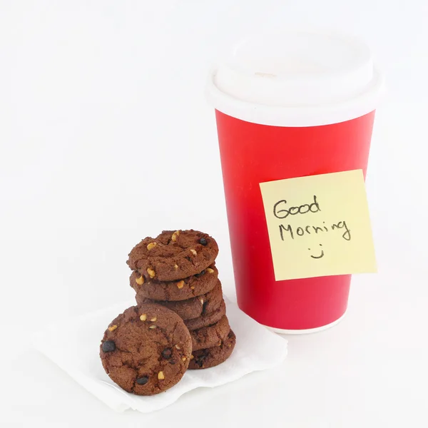 Paper coffee cup with good morning note and chocolate biscuits next to it — Stock Photo, Image