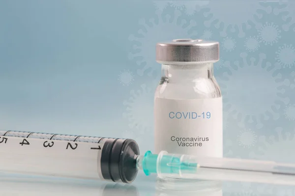 Corona Virus vaccine bottles. Vaccination, immunization, treatment to cure Covid 19 infection. Healthcare And Medical concept.
