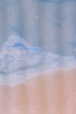 Textured background in various orange and blue shades