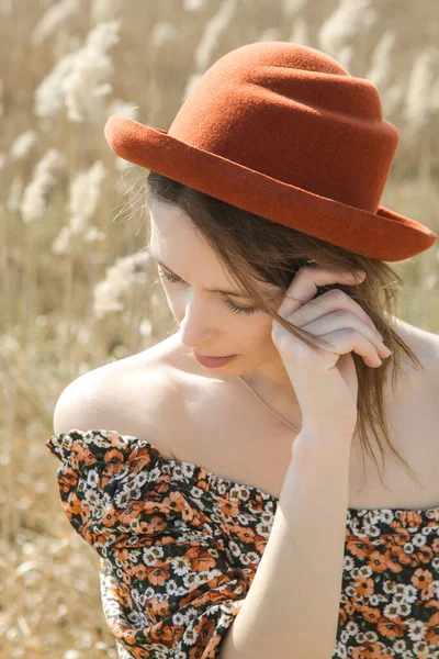 Candid Outdoor Portrait Young Woman Dark Floral Dress Orange Hat — Stock Photo, Image