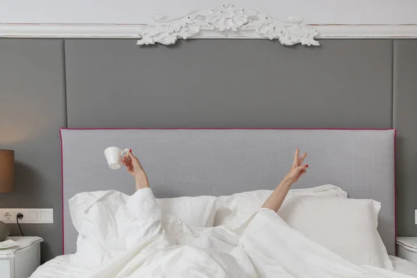 Unrecognizable Woman Waking Morning Bed Hiding Blanket Holding Cup Coffee — Stock Photo, Image