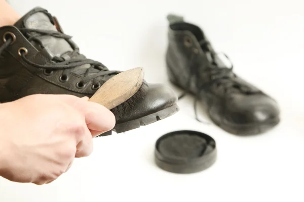 Cleaning of men's boots — Stock Photo, Image