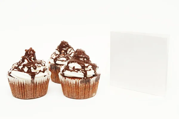 Cupcakes with blank card — Stock Photo, Image