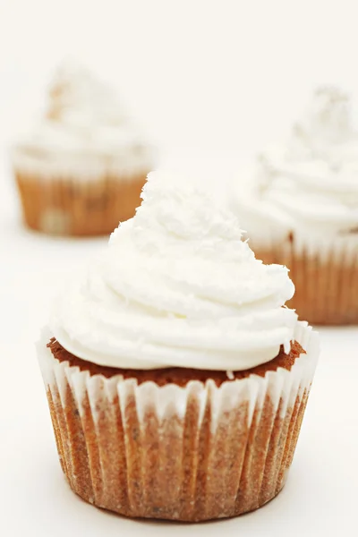 Cupcakes with cream frosting — Stock Photo, Image