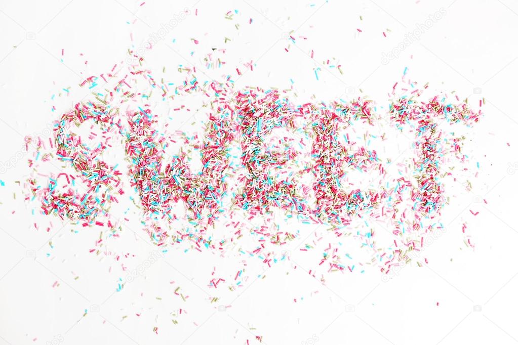 Top view of colorful sprinkles formed word 