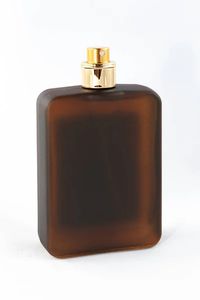 Frasco de perfume marrom fosco para homens em fundo branco — Fotografia de Stock