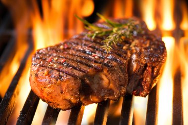 Beef steak on the grill clipart