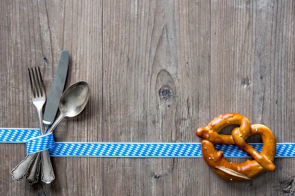 Bavarian cutlery on wooden table with copy space — Stock Photo, Image