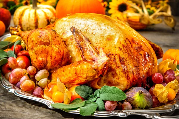 Roasted turkey on holiday table — Stock Photo, Image