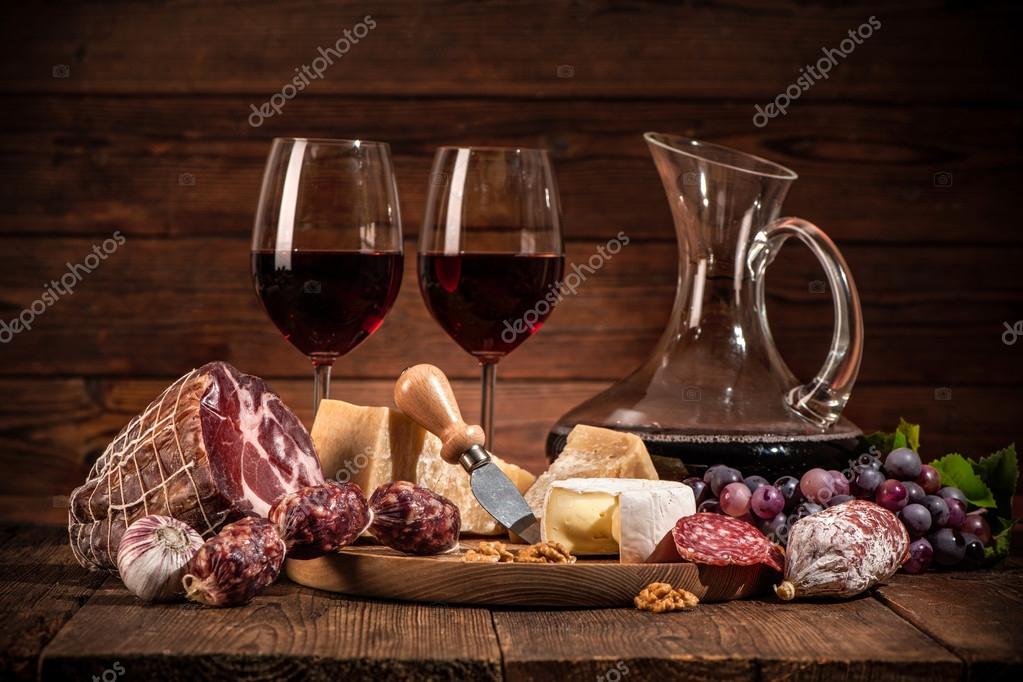 Still life with wine, cheese and sausages Stock Photo by ©alexraths
