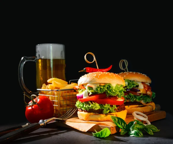 Delicious hamburgers with french fries — Stock Photo, Image