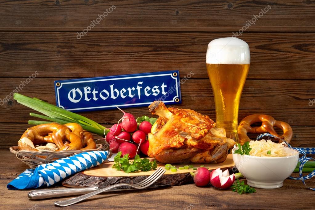 Pork knuckle with beer and sauerkraut Stock Photo by ©alexraths 119946476