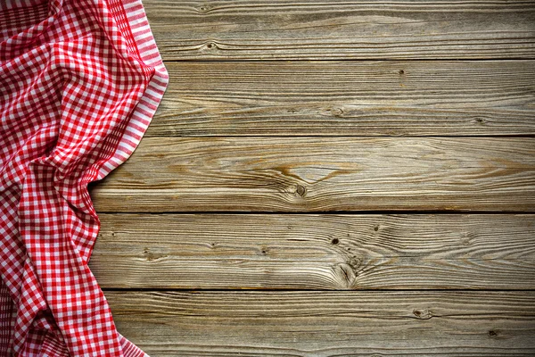 Tischdecke auf Holztisch — Stockfoto