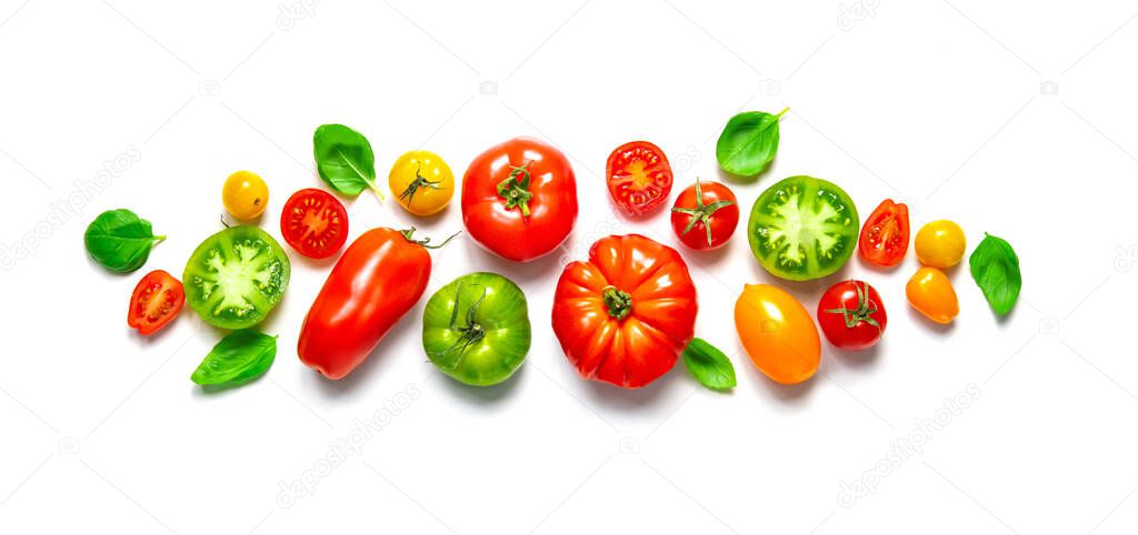 Fresh ripe tomatoes of different varieties with basil leaves isolated on white panoramic background. Applicable for kitchen glass back wall, splash back
