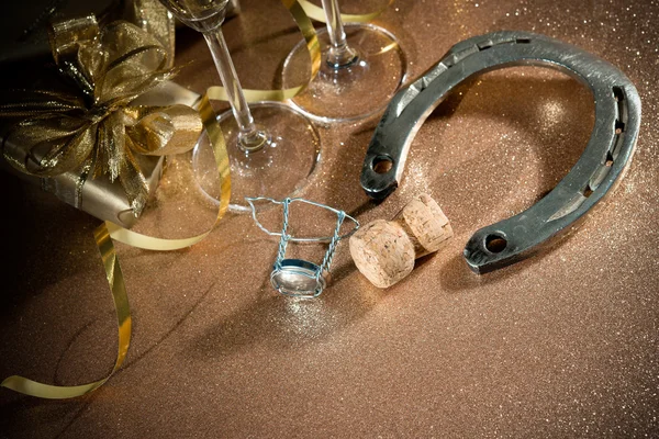 Cork from champagne bottle with a horseshoe — Stock Photo, Image