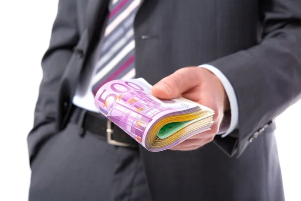 Businessman with money in hand — Stock Photo, Image