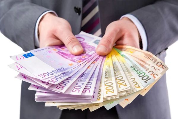 Businessman with money in hand — Stock Photo, Image
