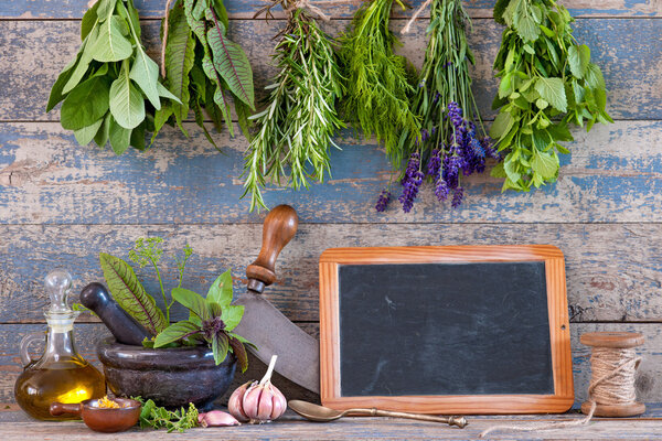Message board and various fresh herbs