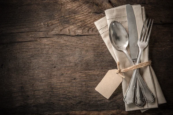 Vintage silverware with an empty tag — Stock Photo, Image