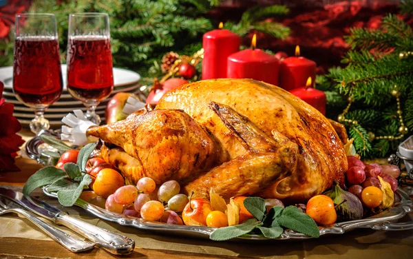 Roasted turkey on holiday table — Stock Photo, Image