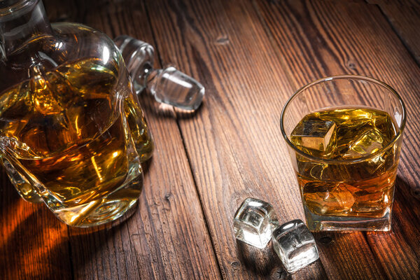 Whiskey drinks on wood