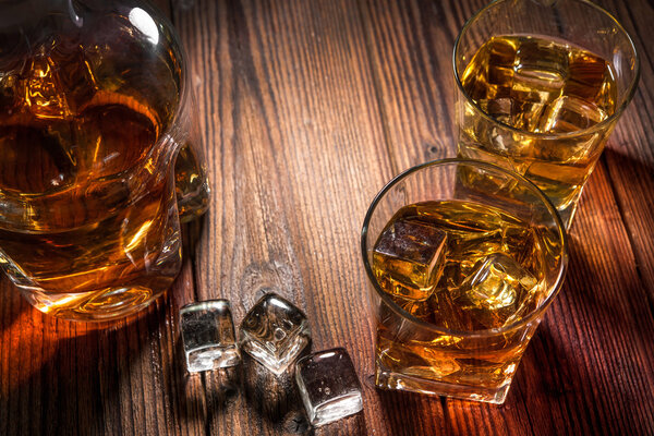 Whiskey drinks on wood