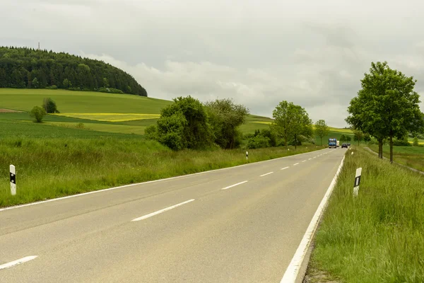 Paved road in hilly countryside, Baden Wuttenberg, Germany — Stock Photo, Image