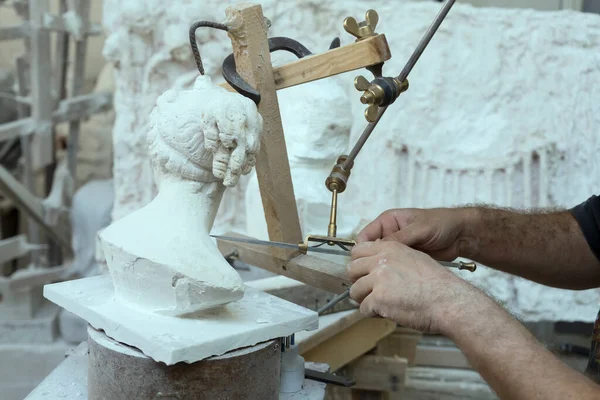 Detail Hands Marble Sculptor Operating Traditional Three Dimensional Engraving Machine Royalty Free Stock Images