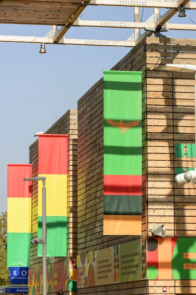 Colorful banners on facades of Fruits and Legumes cluster, EXPO — Stock Photo, Image