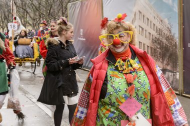 big smile of female clown at Carnival parade, Stuttgart