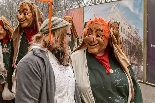 Woman and smiling mask at Carnival parade, Stuttgart — Stok fotoğraf