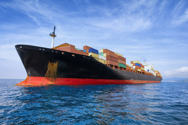 commercial cargo ship carrying containers