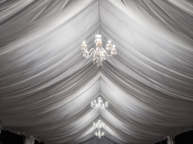 classic chandeliers on event party tent clipart