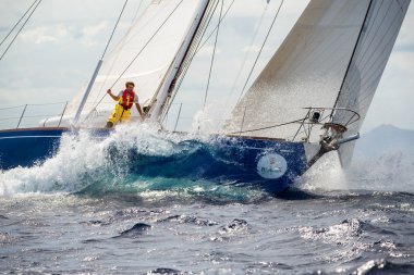 PORTO CERVO - 8 SEPTEMBER: Maxi Yacht Rolex Cup sail boat race. The event is one of international sailing most important and revered competitions. on September 8 2015 in Porto Cervo, Italy clipart